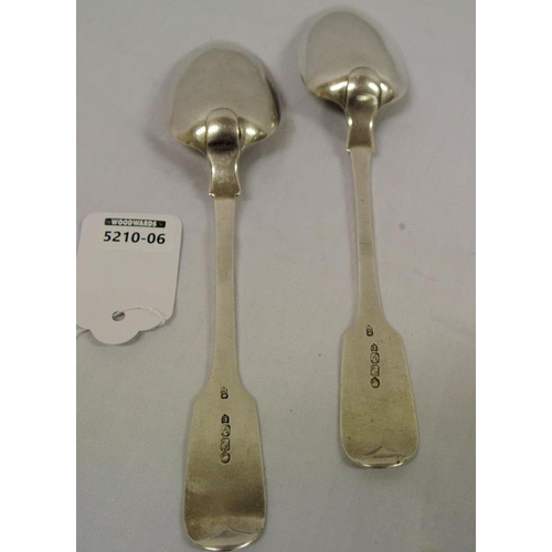 203 - Pair of Victorian Irish silver spoons with crested fiddle pattern handles, 89g