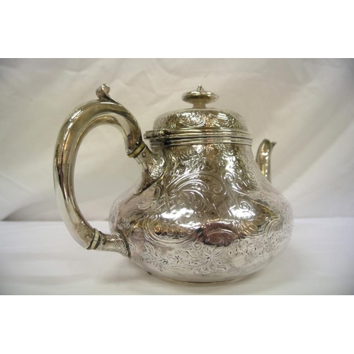 222 - Victorian Irish silver teapot of bulbous form with ornate scroll rococo and foliate decoration, shap... 