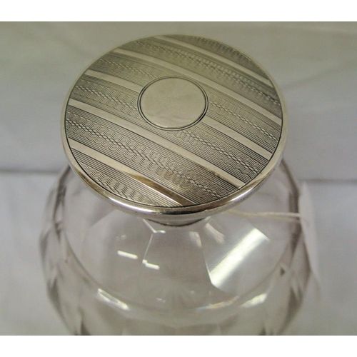 32 - Silver topped round glass scent bottle with round top