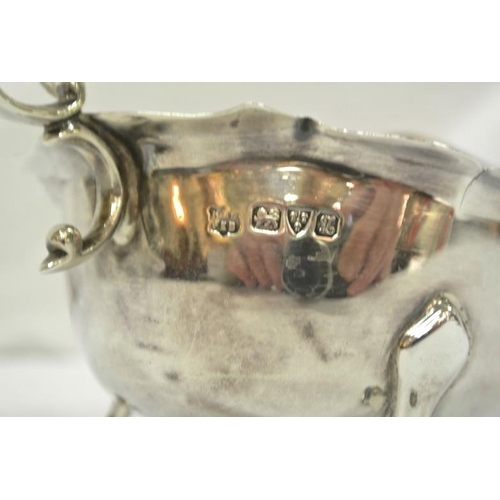 57 - Chester silver boat-shaped sauceboat with wavy rim, shaped handle and hoof feet, dated 1925, 142g