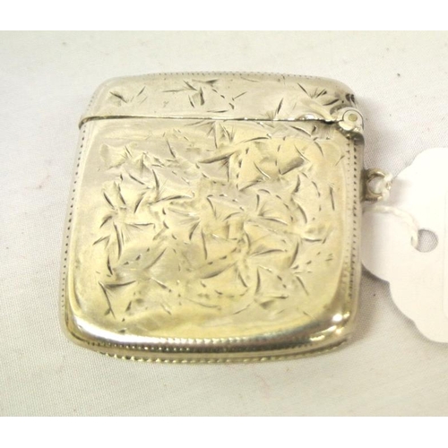 60 - Birmingham silver vesta match box with foliate and inscribed decoration, dated 1901,27g