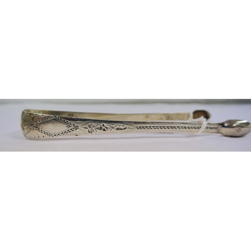 84 - Georgian English silver sugar or ice cube tongs with bright cut decoration and oval grips 33g