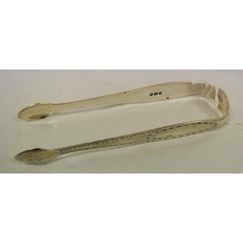 91 - Georgian English silver bright cut sugar tongs with oval decorated panels and oval grips with serrat... 