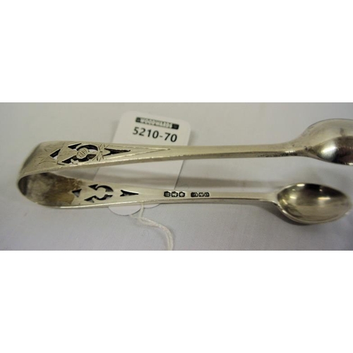 97 - Sheffield silver sugar tongs with thistle decorated pierced handle and oval grips 43g, 12cm