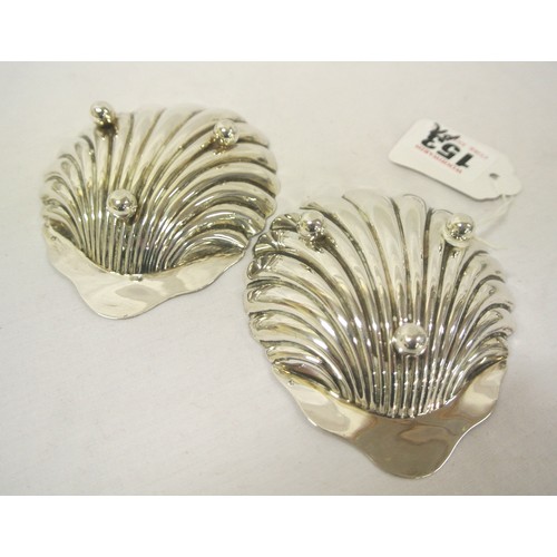 153 - Pair of Victorian Sheffield silver shell shaped bon bon dishes, raised on three ball feet, dated 190... 