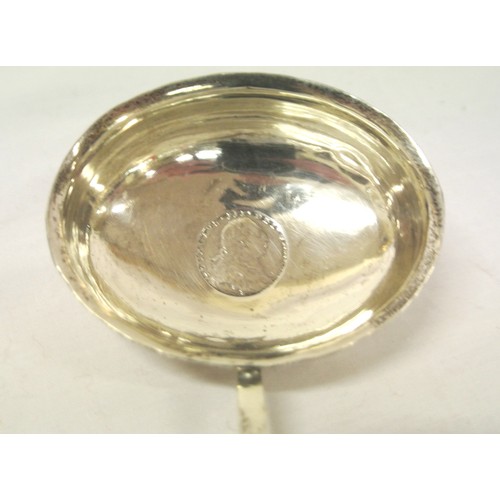 159 - Georgian style silverplated toddy ladle with twist reeded handle and oval bowl with coin inset