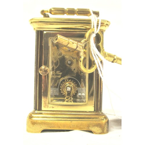 246 - L'Epee miniature Swiss brass cased carriage clock with shaped handle and enamel dial, bevelled glass... 