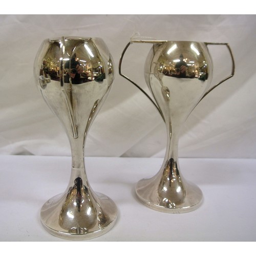 130 - Pair of Birmingham silver art deco bud vases of round waisted form with spreading bases and shaped h... 