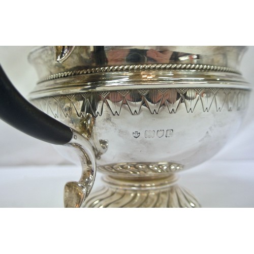 137 - George V London silver teapot of round tapering form with beaded decoration, shaped handle and spout... 