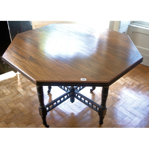 26 - Edwardian mahogany hexagonal centre or occasional table with turned columns, railed stretcher, on ca... 