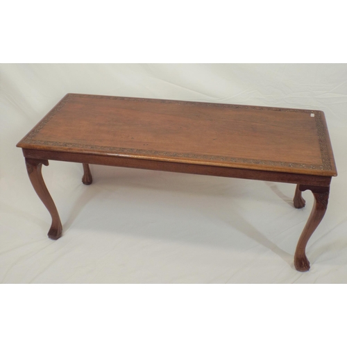 34 - Edwardian mahogany oblong occasional or coffee table with foliate decorated border, on cabriole legs