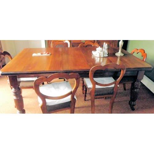 35 - Victorian style mahogany extending dining table with extra leaf inset, angled corners, on turned ree... 