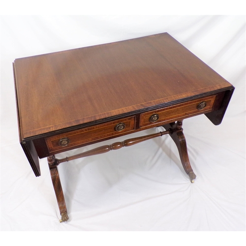 50 - Edwardian style mahogany sofa table with reeded borders, drop leaves with pull-out supports, 2 friez... 
