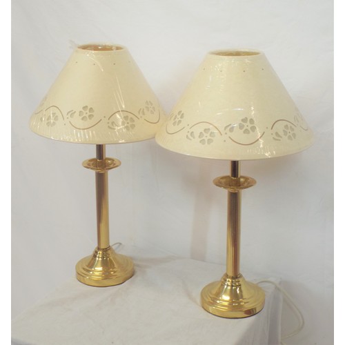 52 - Pair of ornate brass table lamps with Corinthian columns and round bases