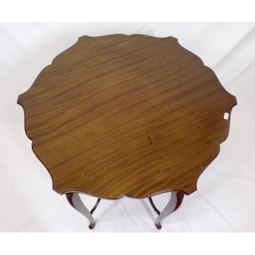 61 - Edwardian mahogany centre or occasional table with wavy border, on cabriole legs with shaped stretch... 