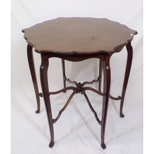 61 - Edwardian mahogany centre or occasional table with wavy border, on cabriole legs with shaped stretch... 