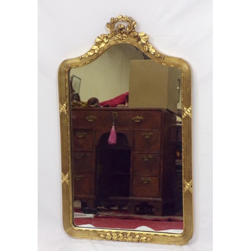 68 - Regency design gilt framed wall mirror with reeded decoration and foliate pediment