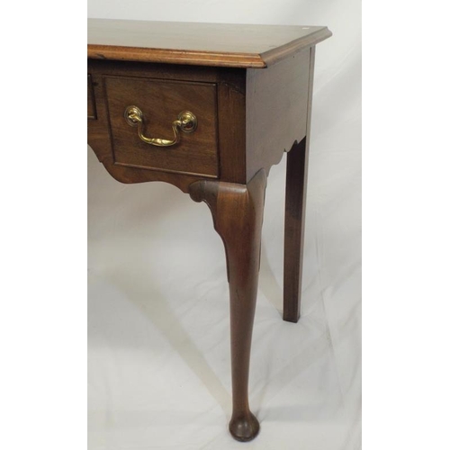 69 - Edwardian mahogany lowboy with three drawers, brass drop handles, on cabriole legs with pad feet