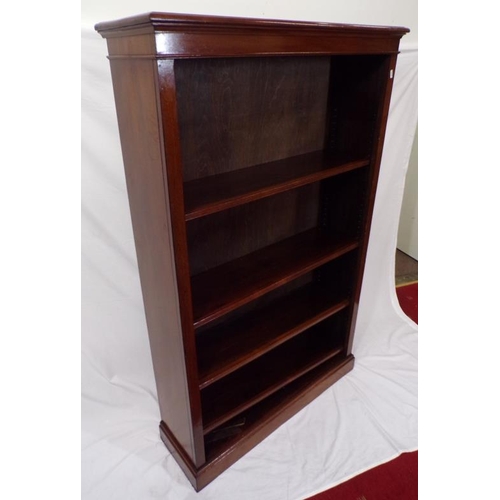 85 - Edwardian mahogany bookcase with adjustable shelving, on oblong plinth