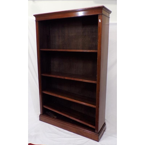 85 - Edwardian mahogany bookcase with adjustable shelving, on oblong plinth