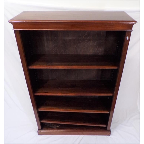 85 - Edwardian mahogany bookcase with adjustable shelving, on oblong plinth