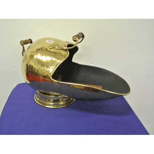 123 - Georgian style brass helmet shaped coal scuttle with shaped timber handles and round base