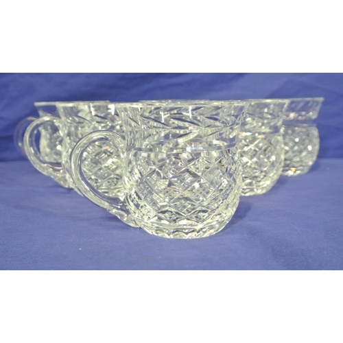 128 - Set of six Waterford Crystal cups with hobnail and faceted decoration, and shaped handles