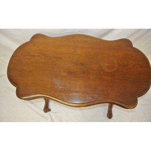 136 - Victorian mahogany and walnut serpentine shaped oblong occasional table with turned tapering columns... 