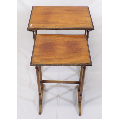 141 - Nest of two Edwardian mahogany tables with turned tapering columns, cross stretchers and bracket fee... 