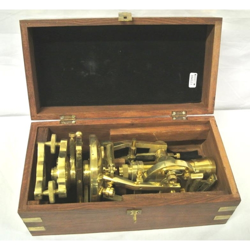 143 - Edwardian brass theodolite with telescope and level on swivel base, in presentation case