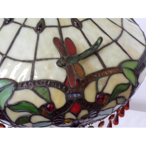 144 - Art Deco style table lamp with ornate and multi-coloured shade, on round base