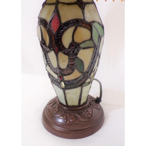 144 - Art Deco style table lamp with ornate and multi-coloured shade, on round base