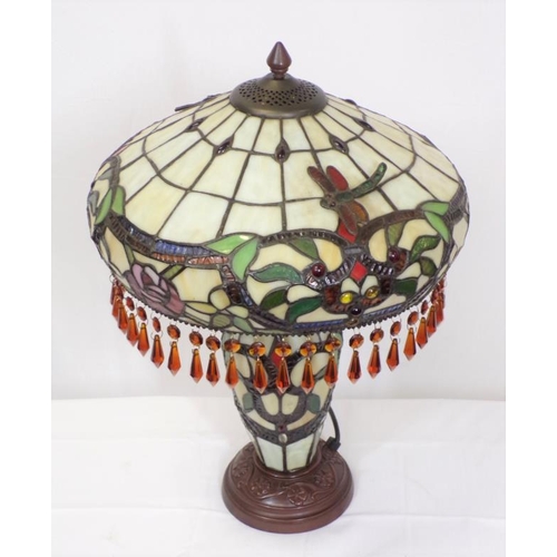 144 - Art Deco style table lamp with ornate and multi-coloured shade, on round base