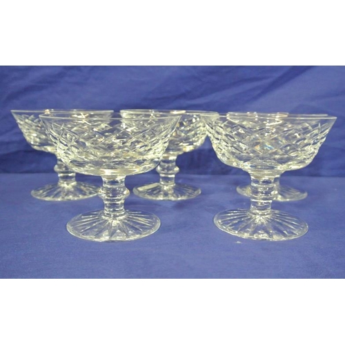 148 - Set of five Waterford Crystal cut glass sundae or champagne glasses with diamond decoration and knop... 