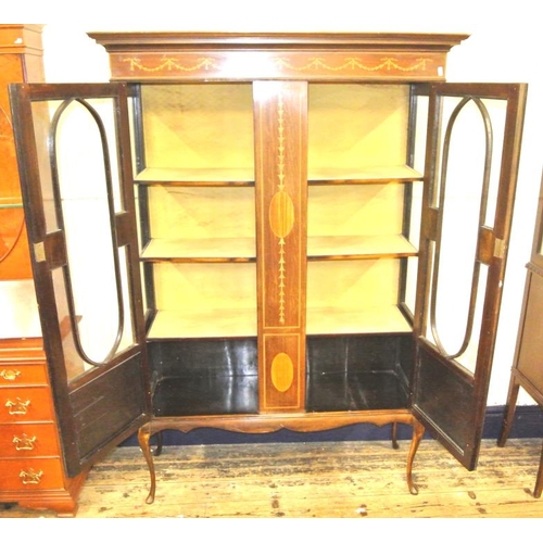 150 - Edwardian inlaid mahogany display cabinet with glazed doors and sides, shelved interior, ornate ribb... 