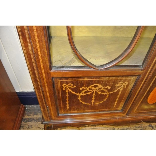 150 - Edwardian inlaid mahogany display cabinet with glazed doors and sides, shelved interior, ornate ribb... 