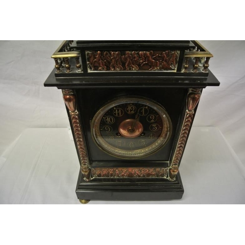 161 - Ornate slate French mantle clock with railed top, Renaissance scene inset, round brass framed dial, ... 