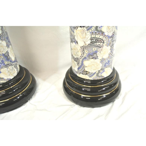 167 - Pair of porcelain Art Nouveau style jardiniere stands with ornate gilt and foliate decoration