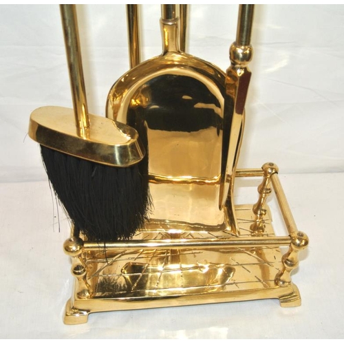 177 - Edwardian style brass companion set on stand with ball shaped tops and rectangular base