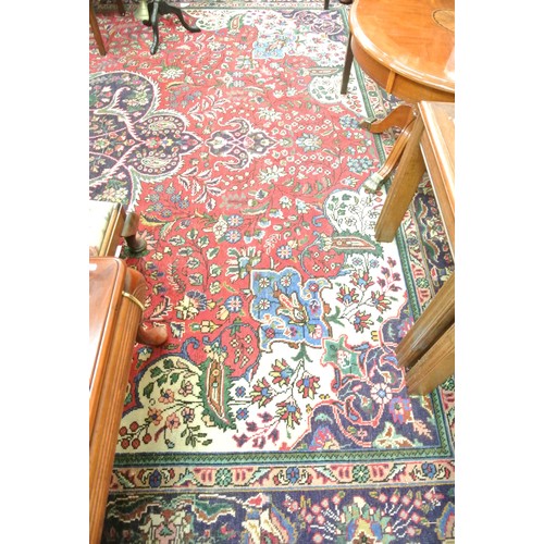 181 - Large multi coloured ground Persian Tabriz carpet with bespoke floral desing