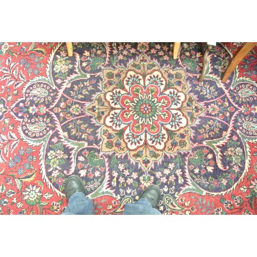 181 - Large multi coloured ground Persian Tabriz carpet with bespoke floral desing