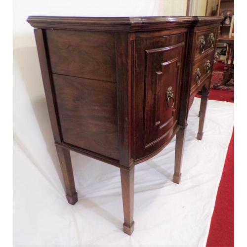 185 - Edwardian mahogany breakfront sideboard with two central drawers, side presses with ornate brass lio... 