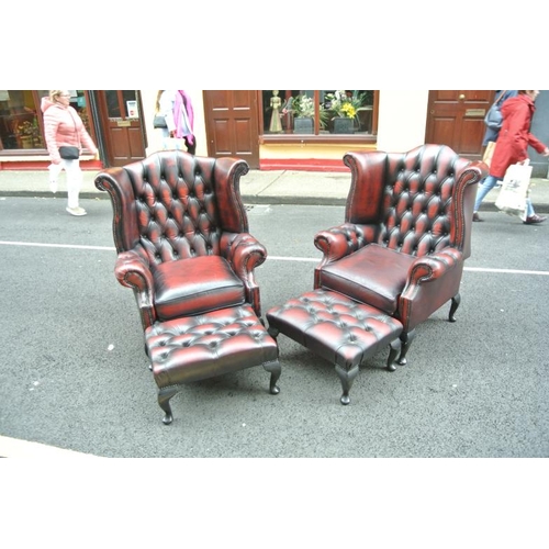 270 - Pair of Georgian design wingback library armchairs with buttoned leather upholstery, brass buttons, ... 