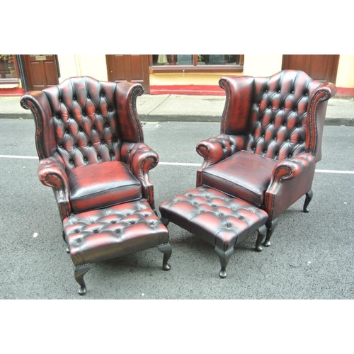 270 - Pair of Georgian design wingback library armchairs with buttoned leather upholstery, brass buttons, ... 