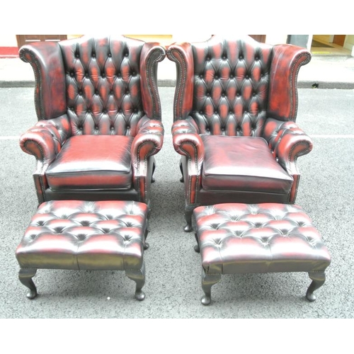 270 - Pair of Georgian design wingback library armchairs with buttoned leather upholstery, brass buttons, ... 