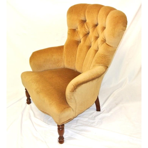 274 - Victorian style upholstered armchair with buttoned back, on baluster turned tapering legs