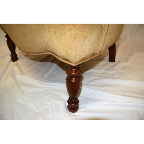 274 - Victorian style upholstered armchair with buttoned back, on baluster turned tapering legs