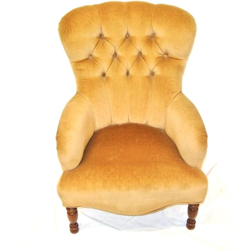 274 - Victorian style upholstered armchair with buttoned back, on baluster turned tapering legs