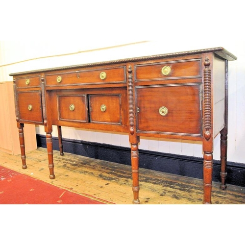 205 - Nelson style mahogany sideboard with rope edge border, three drawers and four presses with reeded bo... 