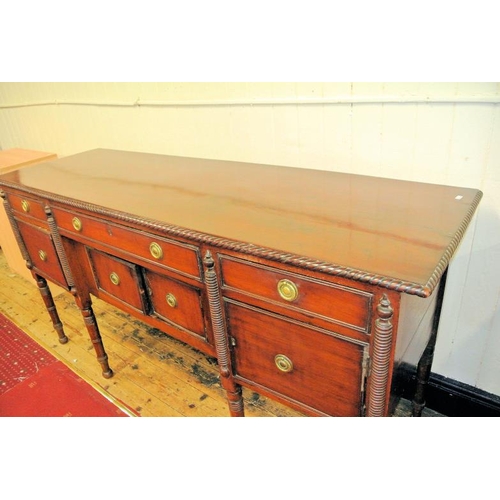 205 - Nelson style mahogany sideboard with rope edge border, three drawers and four presses with reeded bo... 